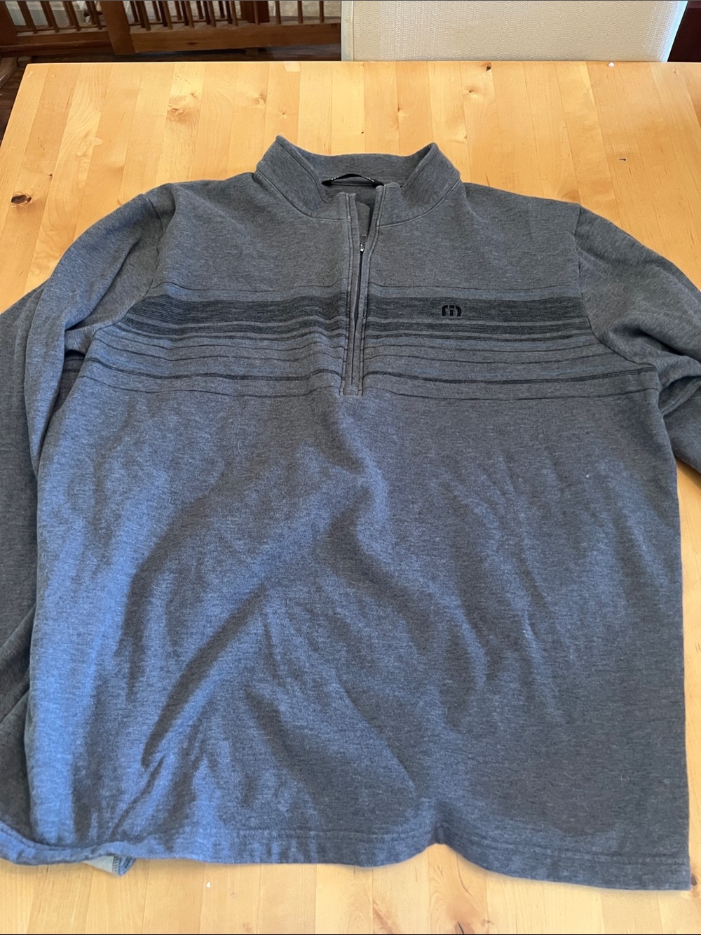 Travis Matthew’s Men's Gray Quarter-Zip Sweater with Subtle Stripe Detail